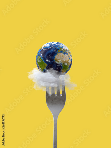 Earth planet on on a fork