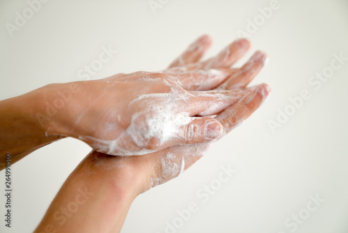close up of woman washing her hands