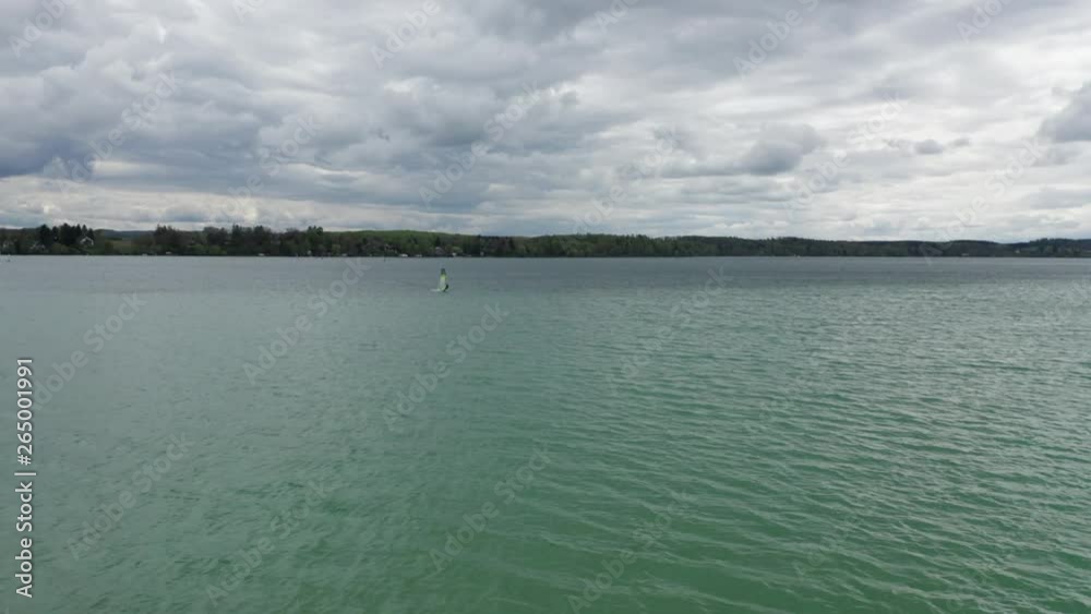 windsurfer in blue german lake aerial windsurfer in blue german lake aerial