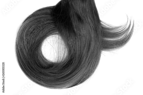 Long black hair isolated on white background. In shape of circle