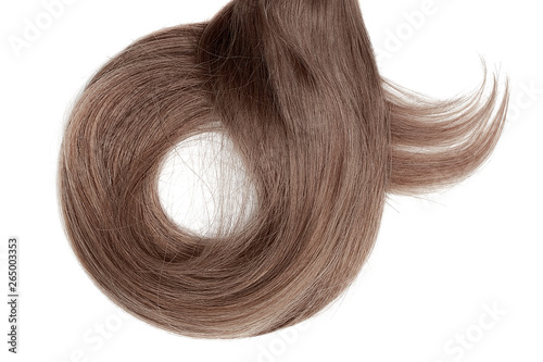 Long brown hair isolated on white background. In shape of circle