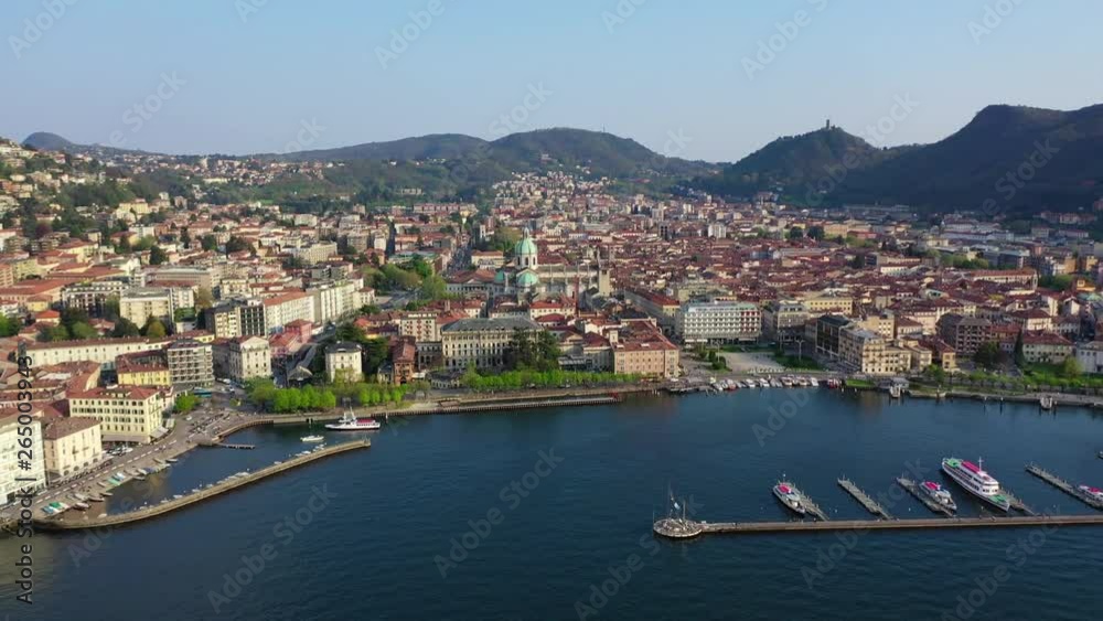 Aerial drone video of famous beautiful village of Como in lake Como one of the deepest in Europe, Lombardy, Italy
