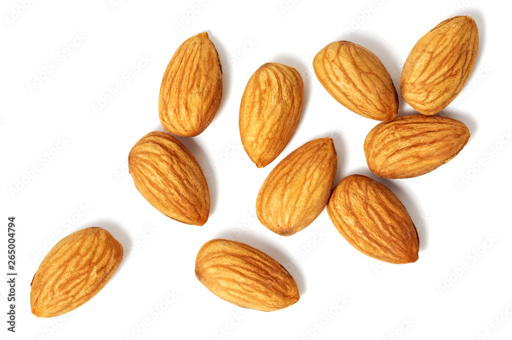 Nuts almonds scattered on a white background. Isolated with shadow. Flat lay. Nuts almonds scattered on a white background. Isolated with shadow. Flat lay.