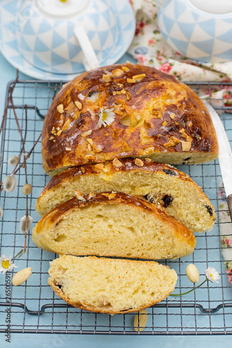 Φωτογραφία German sweet Easter bread Osterbrot with almonds and raisins
