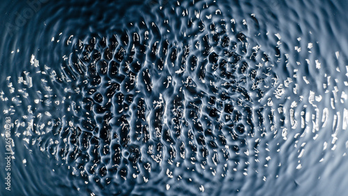 The texture of water under the influence of vibration in 258 hertz photo