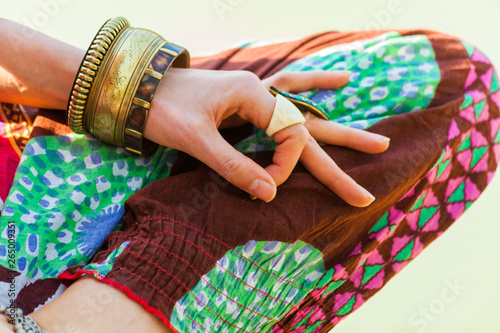 close up of woman hand in mudra gesture practice yoga meditation outdoor by the lake summer day