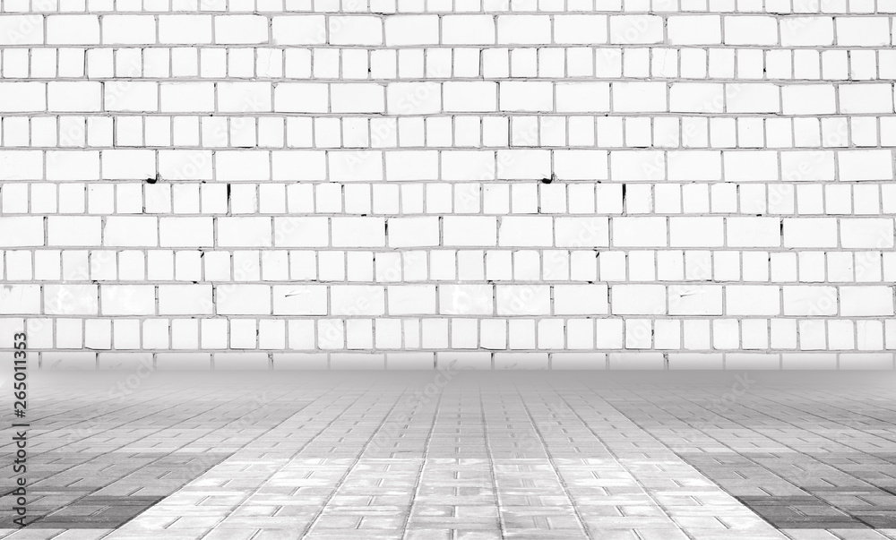 Background of empty gray room with brick wall and concrete floor.