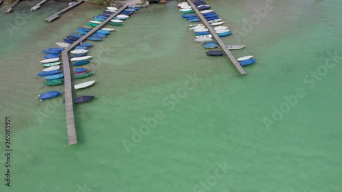 small boats on pier at german lake aerial photo