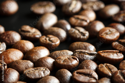 roasted coffee beans on black background, macro