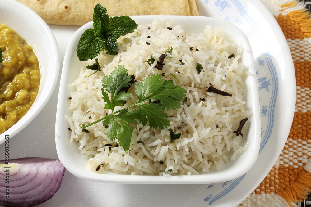 traditional Indian gujarati food dish basmati jeera rice with dal fry