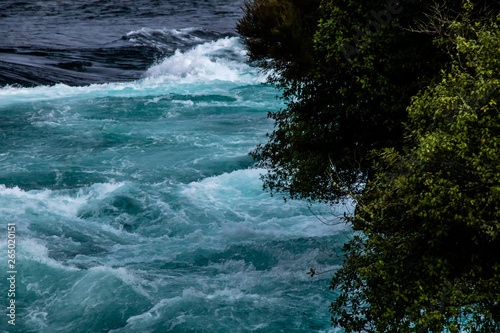 Waikato River flows to the Huka Falls, Taupo, New Zealand