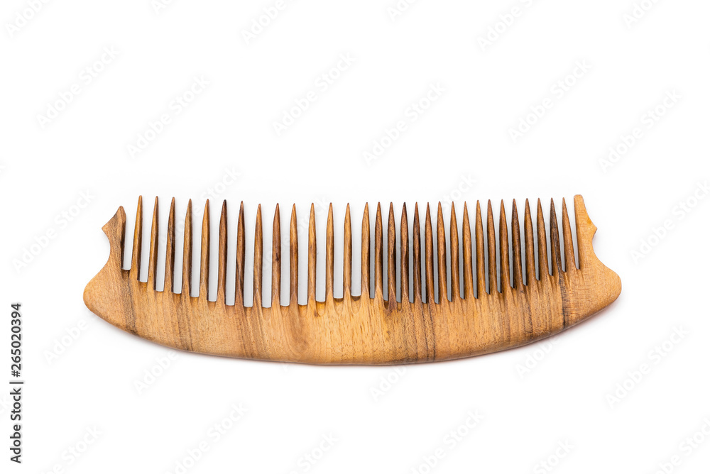 wooden comb on a white background wooden comb on a white background