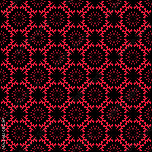 Red patterns on black background.Seamless graphic pattern. 