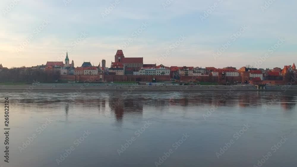 Torun old town reflected in Vistula river, Poland Torun old town reflected in Vistula river, Poland