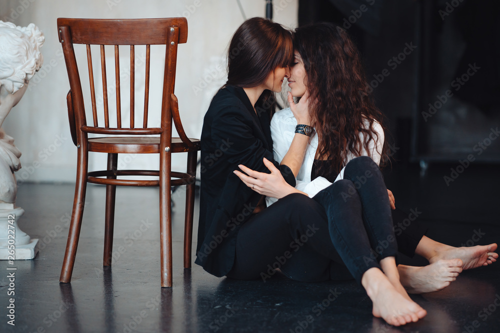 Obraz premium Two girls in each other's tender embraces