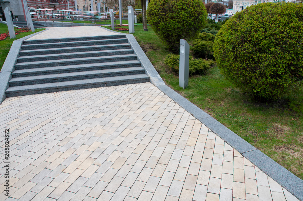 railing and pavement in recreation areas and near architectural buildings