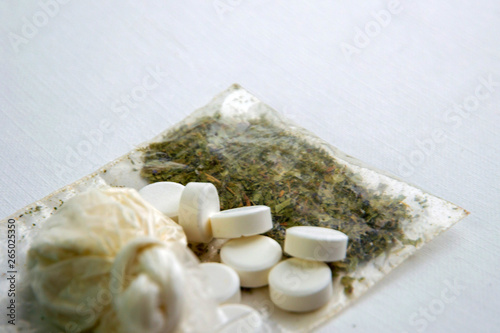 Synthetic Drugs: A few samples of artificial dopey are on the table. short focus