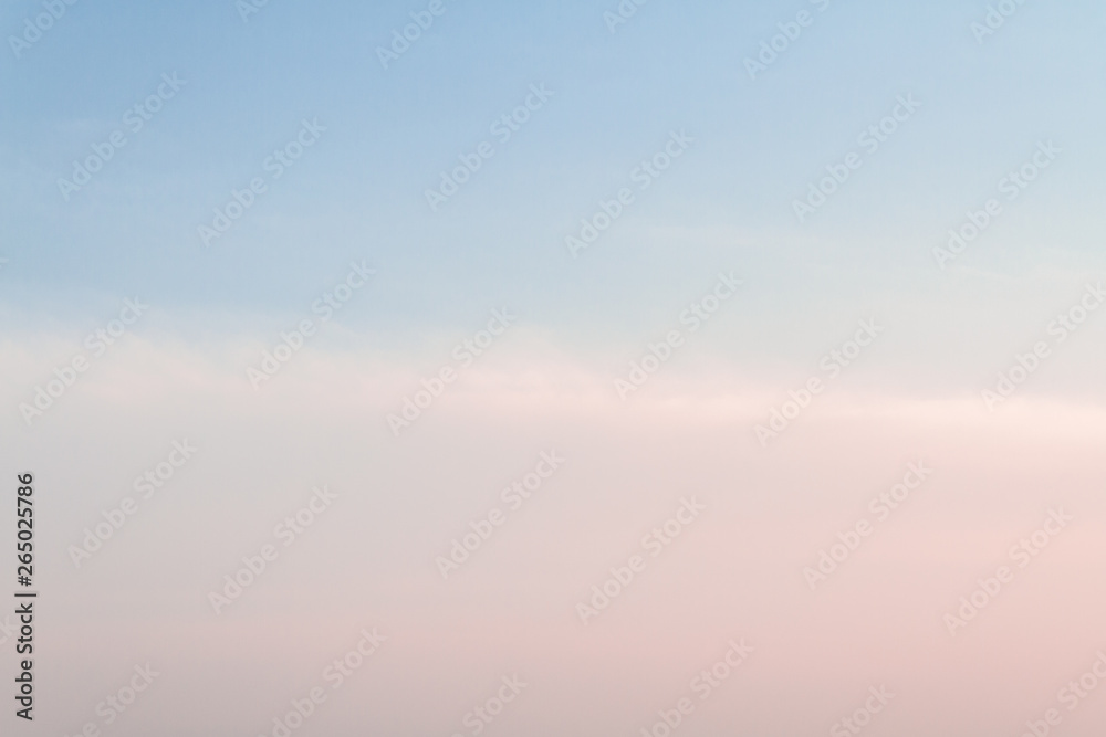 Beautiful sunset sky with feathery pink clouds in spring