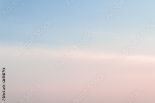 Beautiful sunset sky with feathery pink clouds in spring