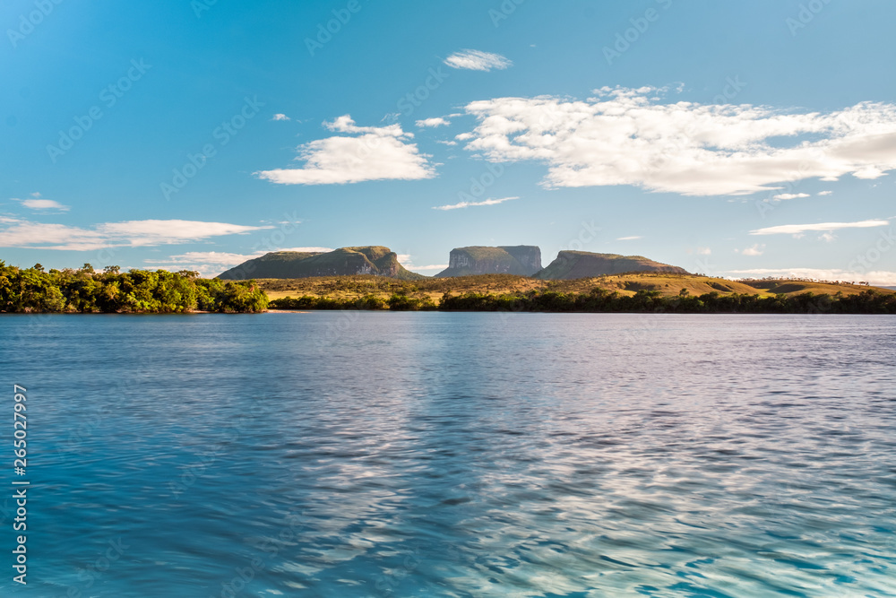 Small Tepuis (Flat Top Mountains) standing across a River in Canaima, Venezuela