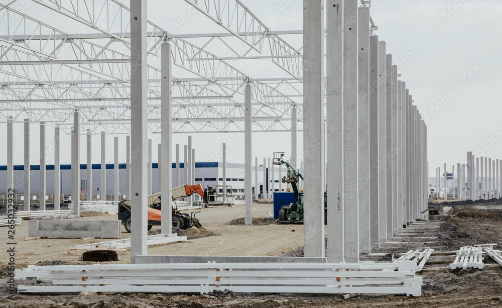 Zdjęcie Stock Concrete poles for the construction of the warehouse