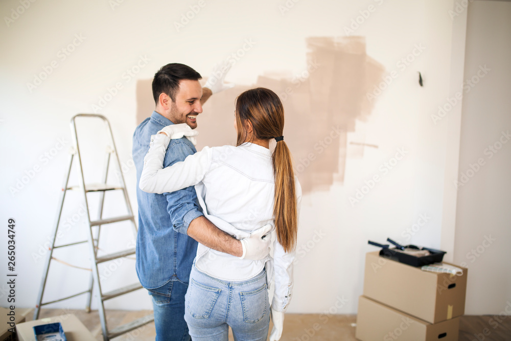 Couple renovating their apartment. Couple renovating their apartment.