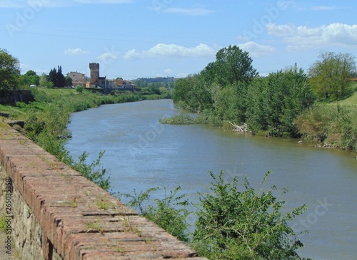 Montelupo Fiorentino, Tuscany, Italy. View from the shore of the river Arno in spring. photo