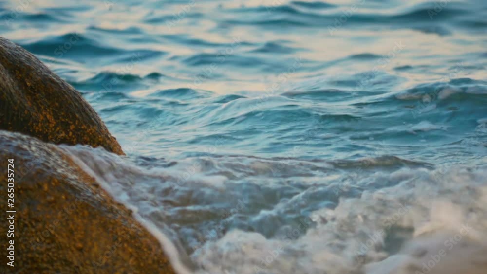 Waves crash on a rock in the sea 4k Waves crash on a rock in the sea 4k