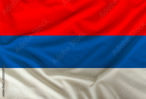 national flag of serbia on silk fabric with soft folds