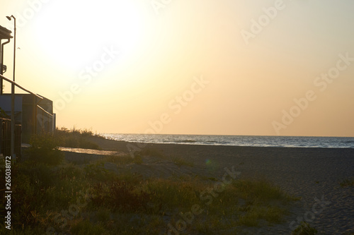 beautiful sandy beach, sunset and sea wave © Олександр Болюх