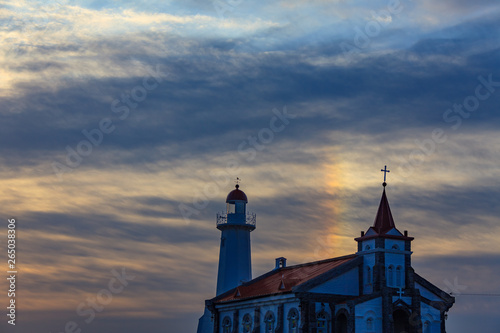 Beautiful sunset and sea Catholic church