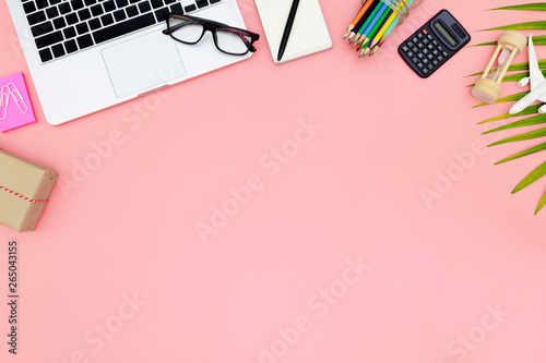 Wallpaper Mural Flat lay office workspace with blank laptop, clipboard, top view laptop background and copy space on pink background, Above view shot of laptop background, Laptop background Torontodigital.ca