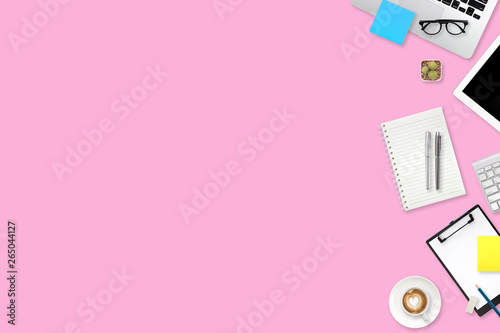 flat lay or top view workspace office pink desk with laptop computer, coffee cup and smartphone using for business background © feeling lucky