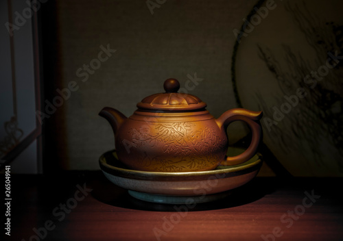 the red enameled pottery teapot