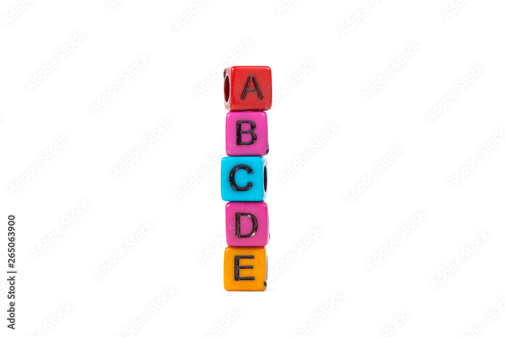 Pile of letter bead or beads with alphabet ABCDE on white background. Pile of letter bead or beads with alphabet ABCDE on white background.