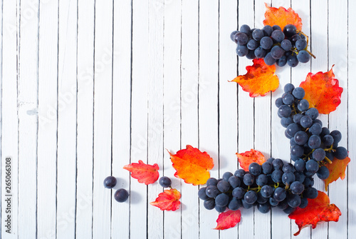 red grapes on white wood table