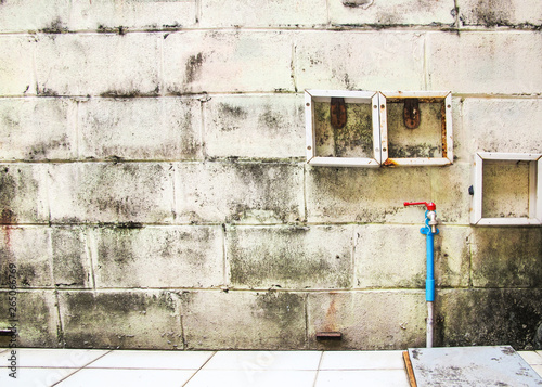 Old Block with blue Pipe and Tap