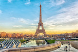 Eiffel Tower at sunset in Paris, France. Romantic travel background