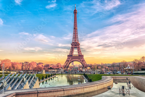 Eiffel Tower at sunset in Paris, France. Romantic travel background © MarinadeArt