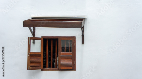 old window with wooden shutters