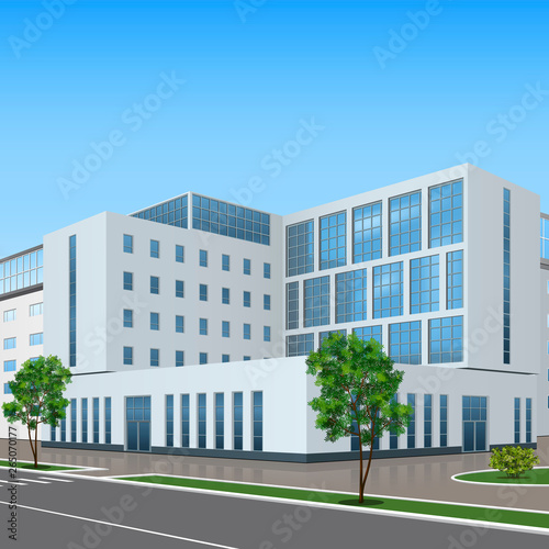 office building with the entrance and a reflection