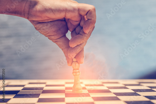 Chess photographed on a chess board,Fight alone photo