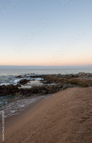 Fototapeta Naklejka Na Ścianę i Meble -  Sunrise on the beach of Lloret de Mar