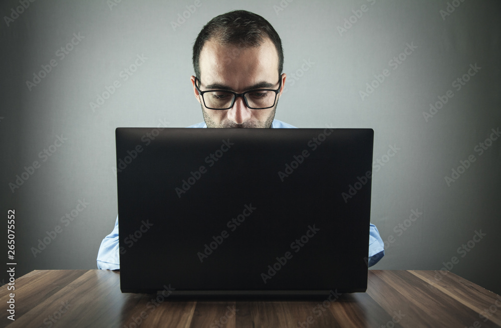 Man using laptop. Working in office Man using laptop. Working in office