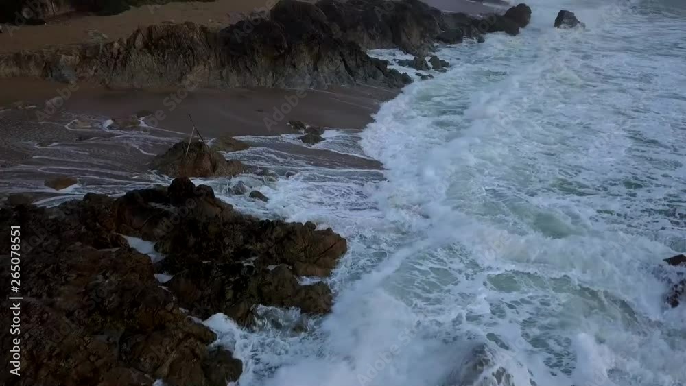 Waves crashing on the beach in Portugal Waves crashing on the beach in Portugal