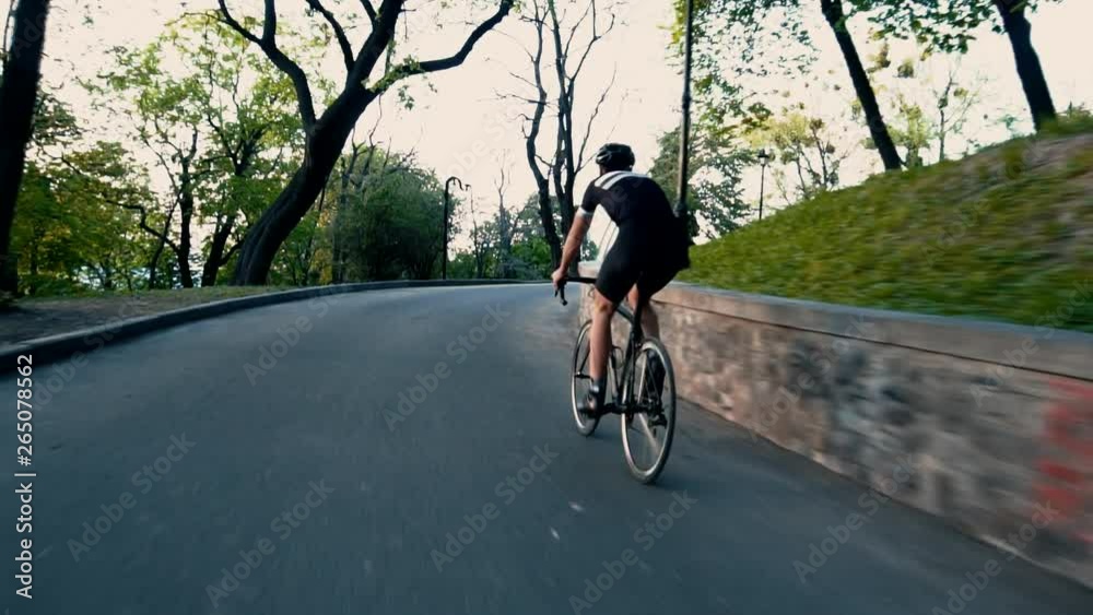 Cyclist Riding In Uphill.Cyclist On Climb.Cyclist Intense Training.Athlete Cyclist Climbing.Cyclist Pedaling In Uphill.Bicyclist Climbing Up Curvy Road.Mountain Bike Cyclist Riding Uphill. Cyclist Riding In Uphill.Cyclist On Climb.Cyclist Intense Training.Athlete Cyclist Climbing.Cyclist Pedaling In Uphill.Bicyclist Climbing Up Curvy Road.Mountain Bike Cyclist Riding Uphill.