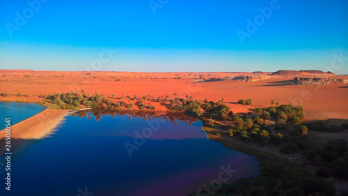 Sunset aerial Panoramic view to Yoa lake group of Ounianga kebir lakes at the Ennedi, Chad photo