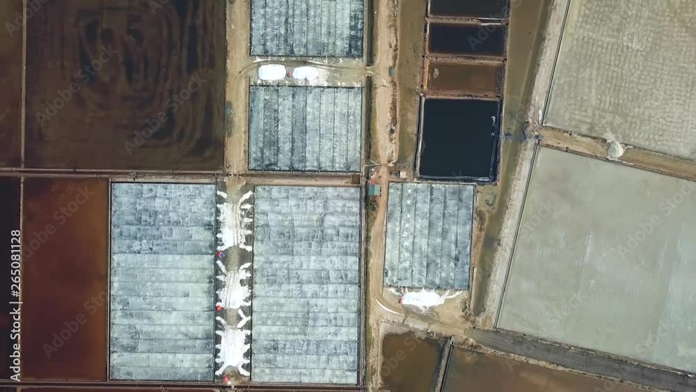 Helicopter top salt pool blue white field plantation pattern. Production of raw materials extraction unique technology evaporation concentrate. Authentic manual labor. Unusual harvest Vietnam. Aerial Helicopter top salt pool blue white field plantation pattern. Production of raw materials extraction unique technology evaporation concentrate. Authentic manual labor. Unusual harvest Vietnam. Aerial