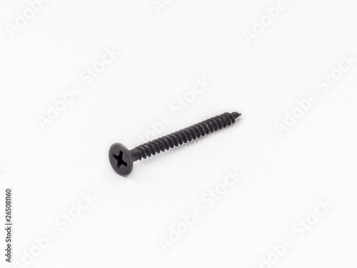 Black zinc coated tapping phillips screw shot on white.