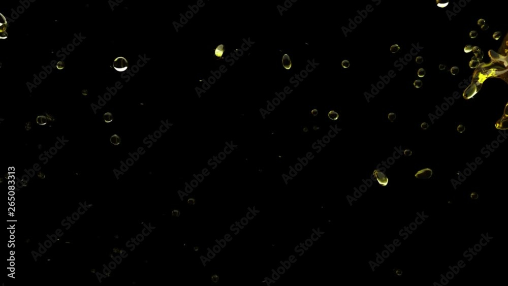 Pure Gold color splash in the air. Shot with a high-speed camera Pure Gold color splash in the air. Shot with a high-speed camera